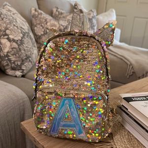 Justice | Mini Gold Unicorn Sequin backpack